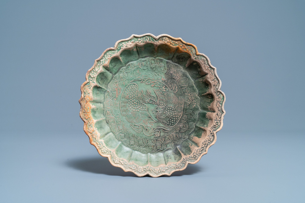 A Chinese green-glazed lotus-shaped 'phoenix' dish, Yuan