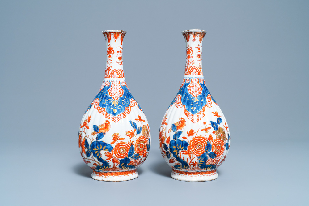 A pair of ribbed Dutch Delft dor&eacute; vases, 18th C.