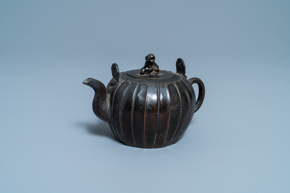 A Chinese lacquered bronze teapot and cover, Yuan