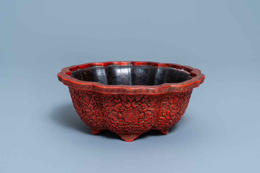 A Chinese carved cinnabar lacquer jardini&egrave;re, Yongzheng/Qianlong