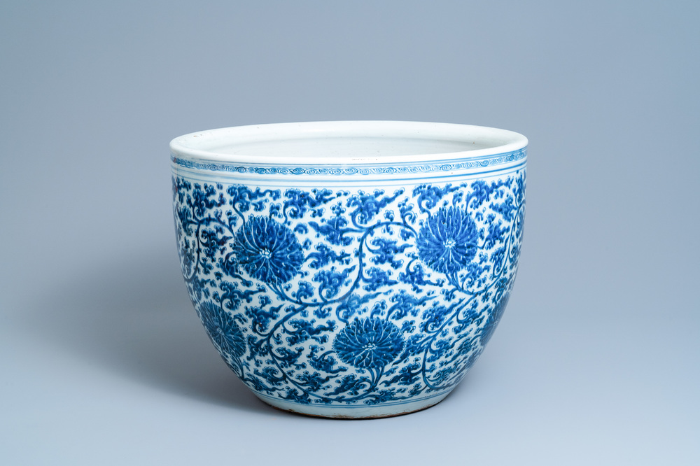 An exceptionally large Chinese blue and white 'lotus scroll' fish bowl, Kangxi