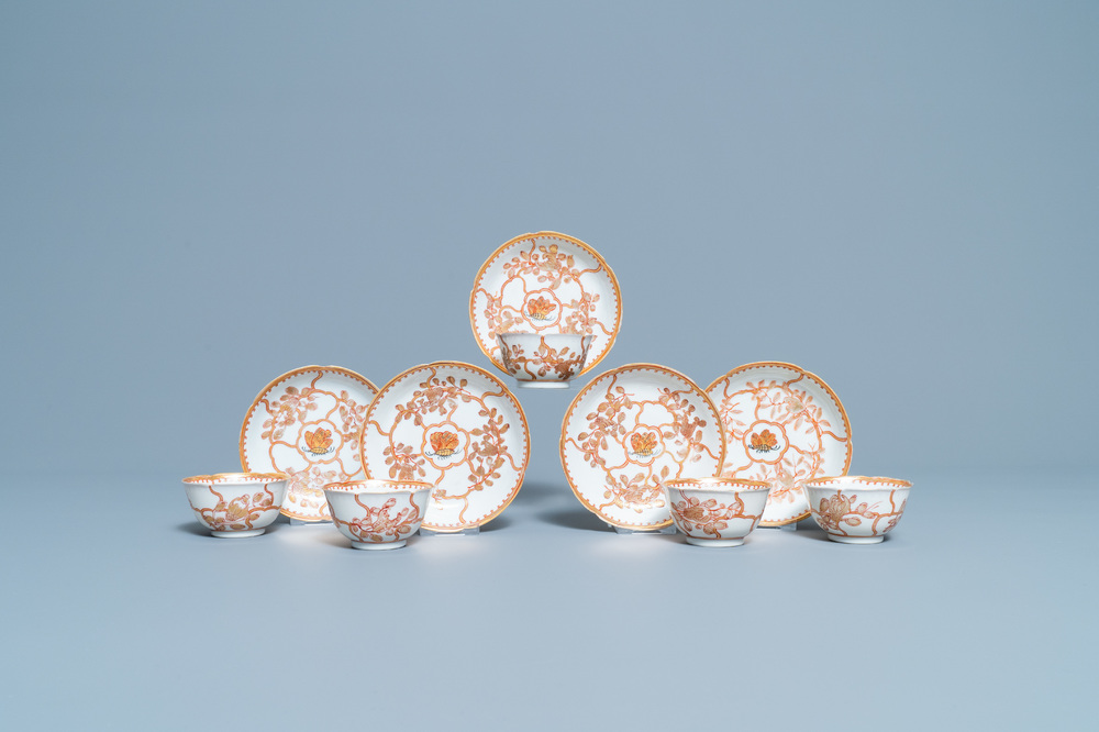 Five Chinese iron red and gilt cups and saucers, Yongzheng/Qianlong