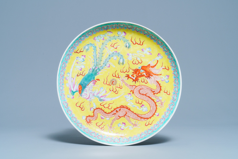 A Chinese famille rose 'dragon and phoenix' yellow-ground dish, Qianlong mark, Republic
