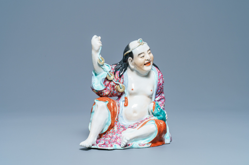 Une figure de Liu Hai en porcelaine de Chine famille rose, marque en creux, R&eacute;publique