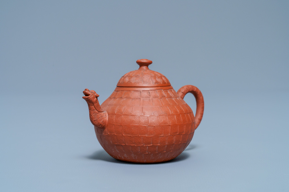 A Chinese Yixing stoneware dragon-spouted teapot and cover, Kangxi