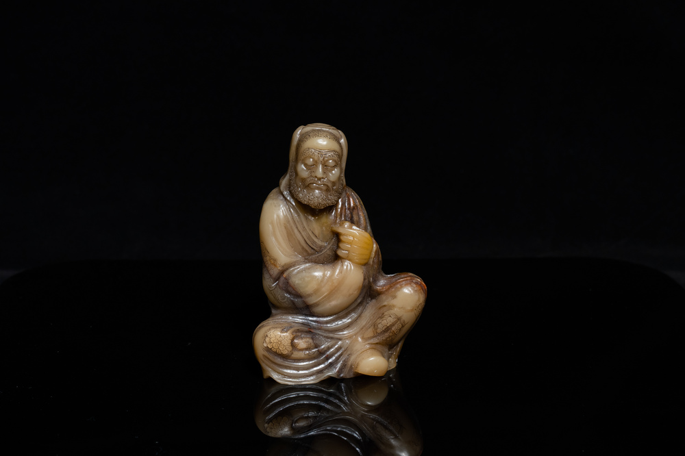 A Chinese Shoushan soapstone figure of a bearded elder, 18th C.