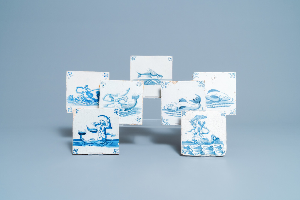 Seven Dutch Delft blue and white tiles with seacreatures, 17th C.