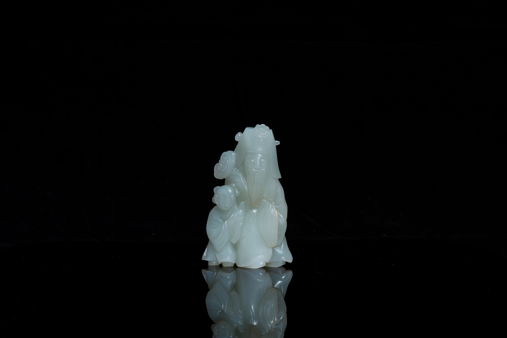 A Chinese jade 'Shou Lao with child' figure, 18th C.