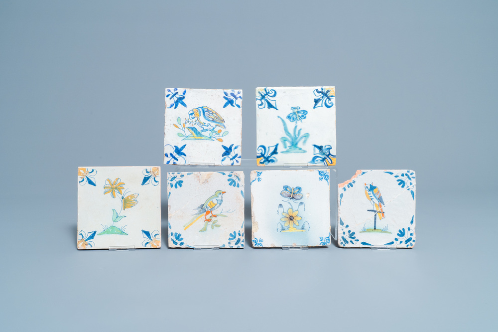 Six polychrome Dutch Delft tiles with birds, insects and flowers, 17th C.