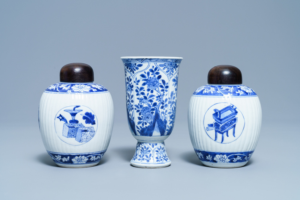 A pair of Chinese blue and white tea caddies and a goblet, Kangxi