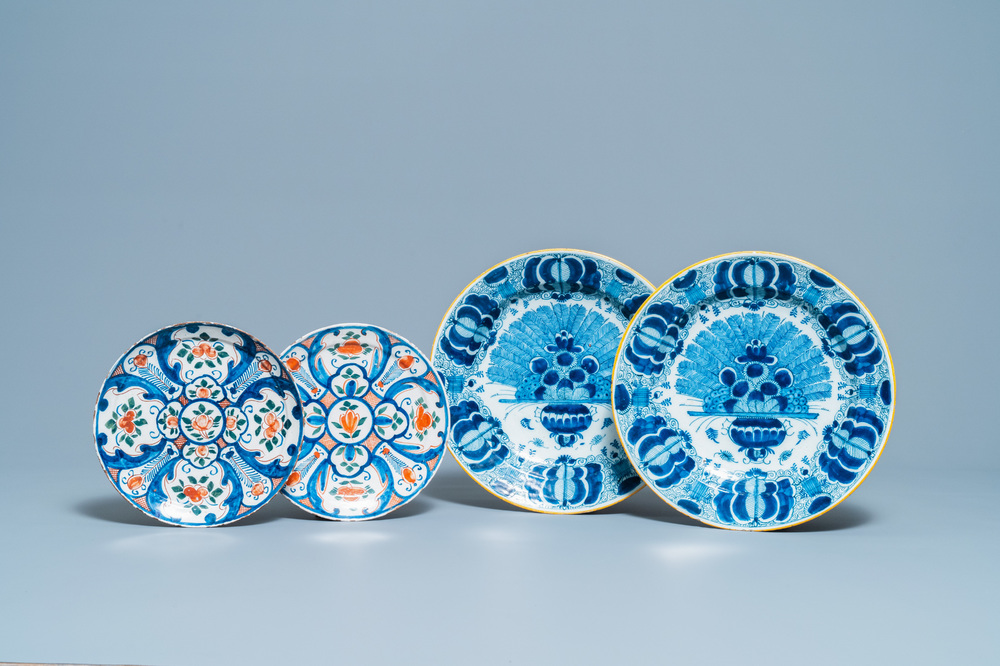 A pair of Dutch Delft blue and white dishes and a pair of polychrome plates, 18th C.