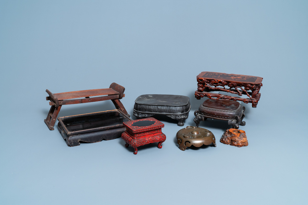 Eight Chinese and Japanese stands in wood, lacquer and bronze, 19/20th C.