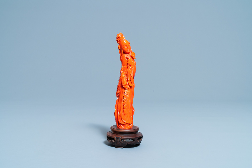 A Chinese carved red coral figure of a lady, 19/20th C.