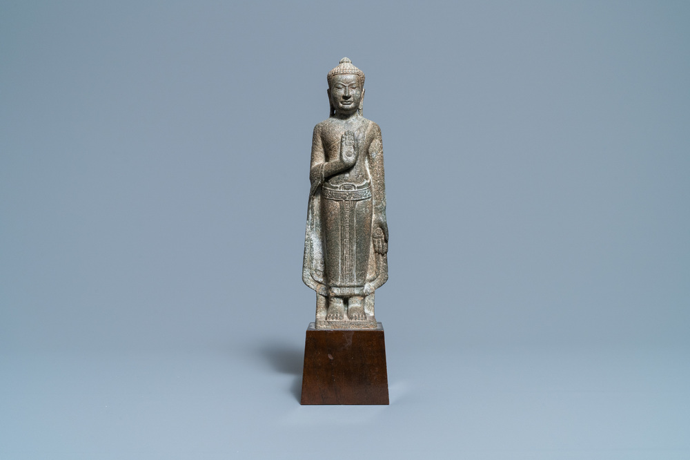 A Thai sandstone figure of Buddha, Khmer, Lopburi, 12/14th C.