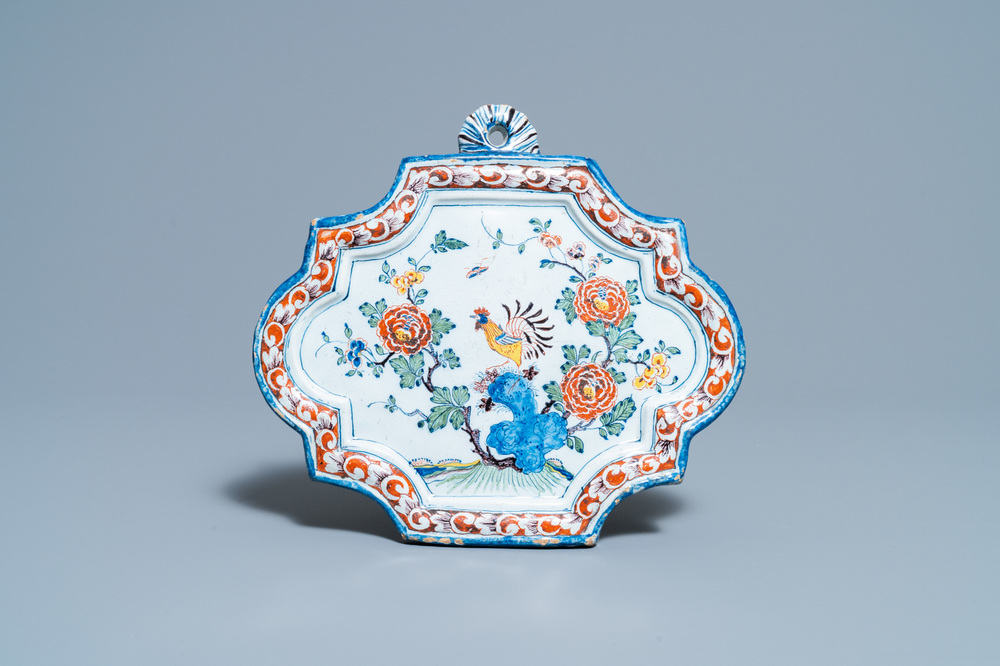 A polychrome Dutch Delft 'rooster' plaque, dated 1763
