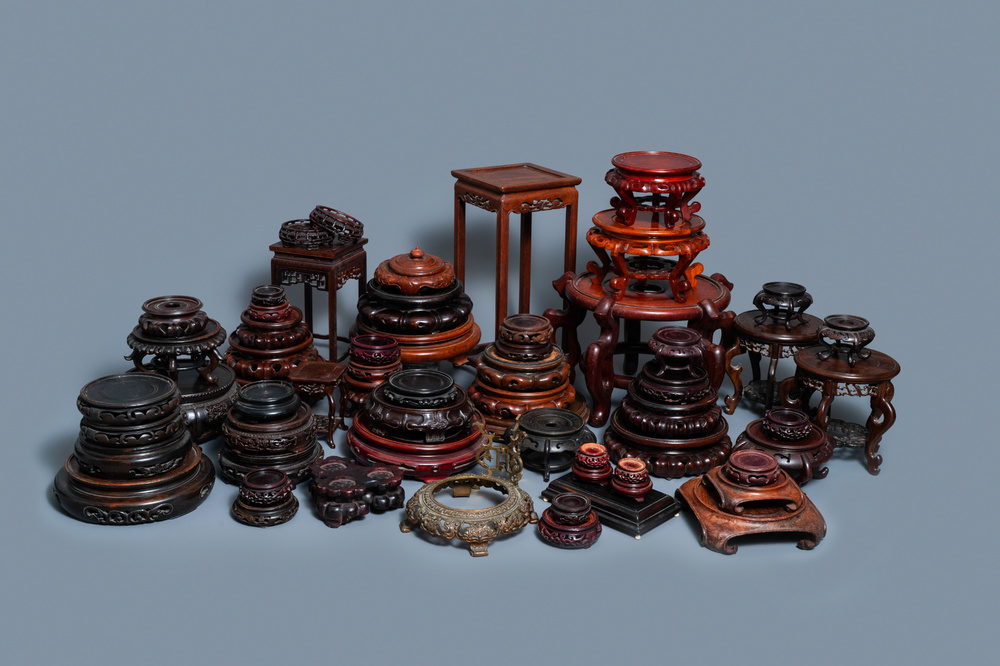 64 Chinese carved wooden stands, 19/20th C.