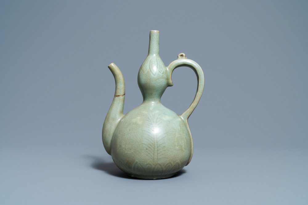 A Korean inlaid-celadon stoneware ewer, probably Goryeo, 13/14th C.