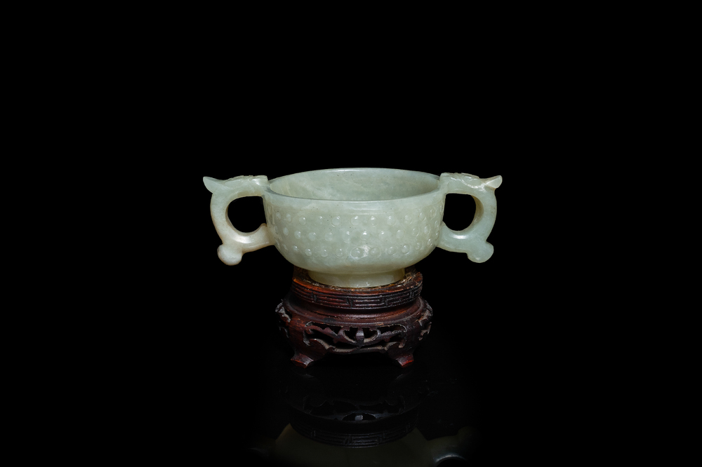 A Chinese celadon jade two-handled libation cup, Ming