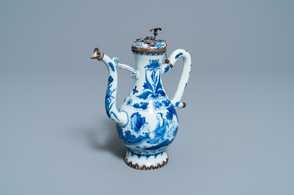 A Chinese blue and white silver-mounted ewer and cover, Transitional period
