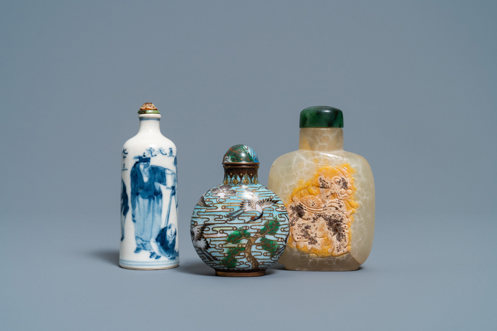 Three Chinese chalcedony, cloisonn&eacute; and porcelain snuff bottles, 19th C.