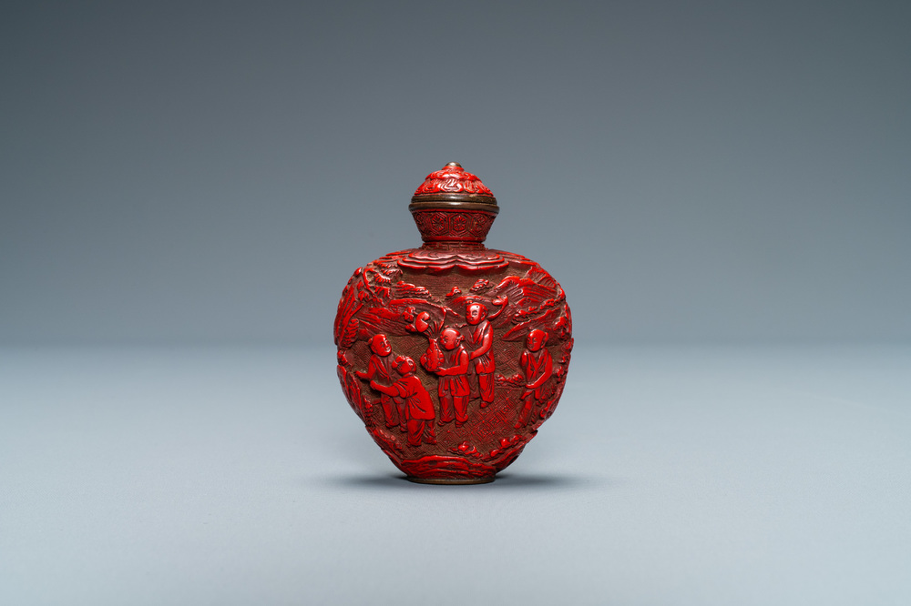 A Chinese carved red cinnabar lacquer 'boys at play' snuff bottle, imperial workshops, Qianlong/Jiaqing
