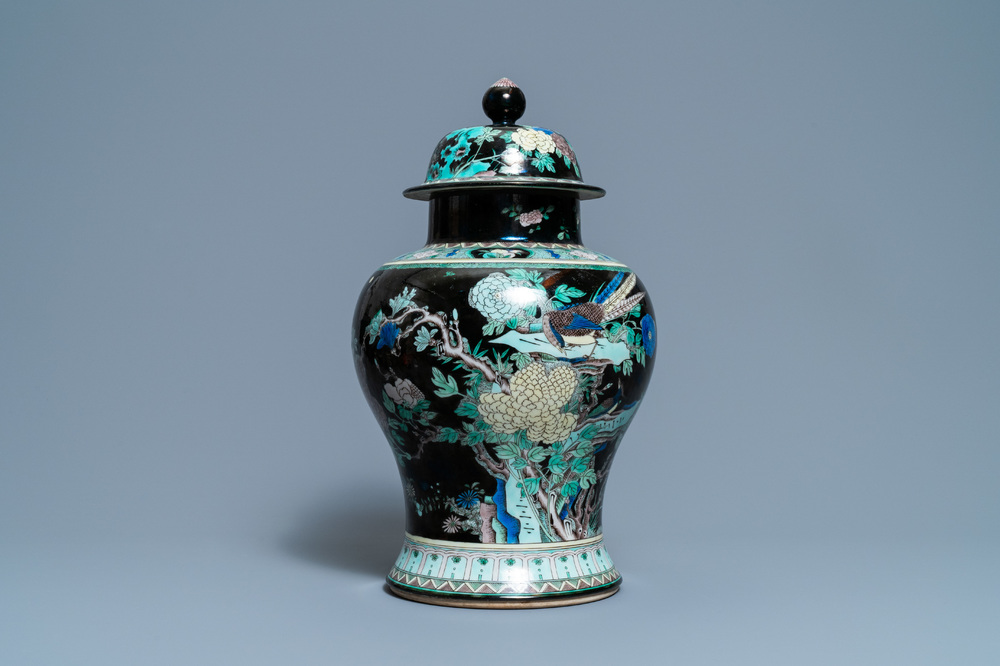 A Chinese famille noire vase and cover, 19th C.