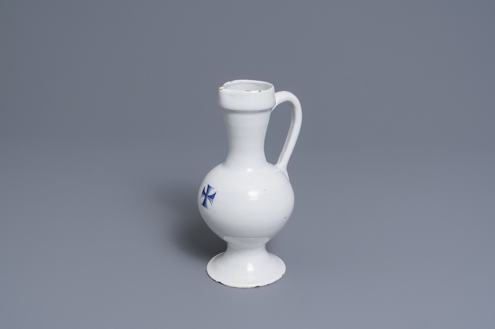 A blue and white jug with a heraldic cross, France or Germany, 17th C.