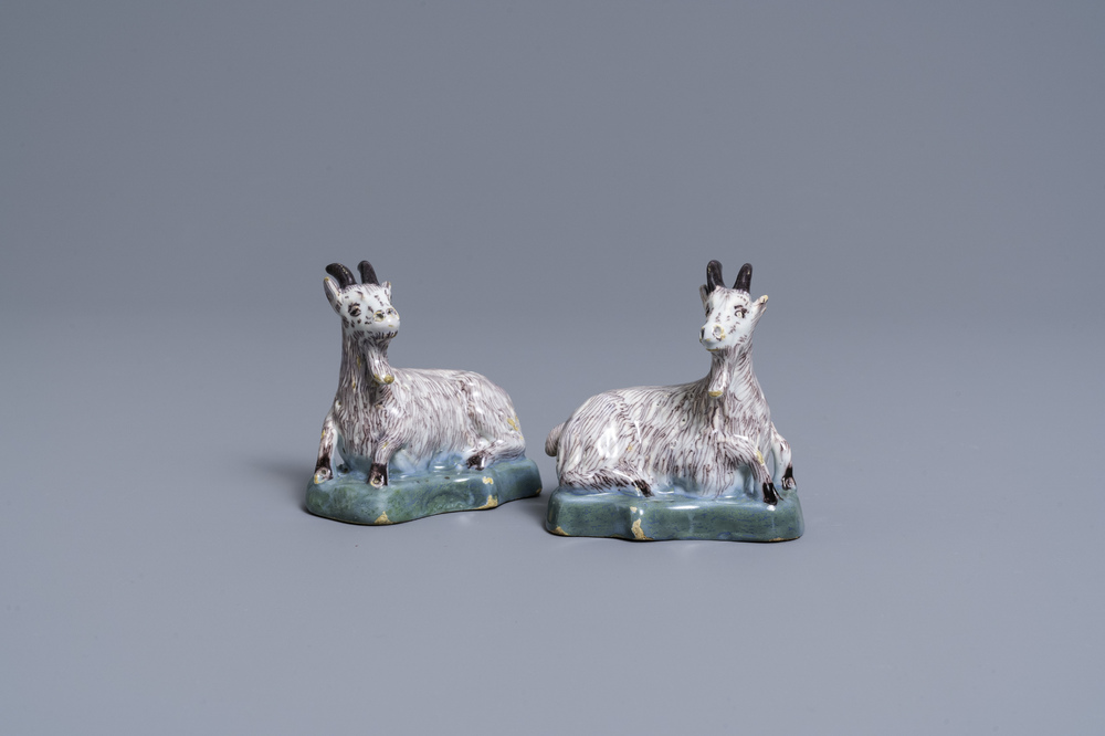 A pair of polychrome Dutch Delft models of goats, 18th C.