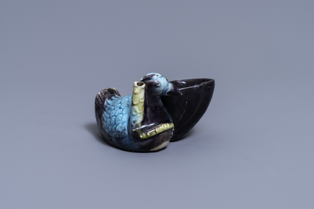 A Chinese aubergine- and turquoise-glazed duck and lotus-shaped water dropper, Kangxi