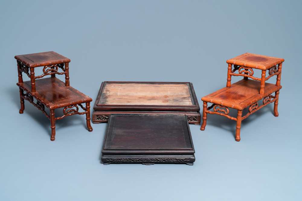 Four large Chinese carved wooden stands, 19/20th C.