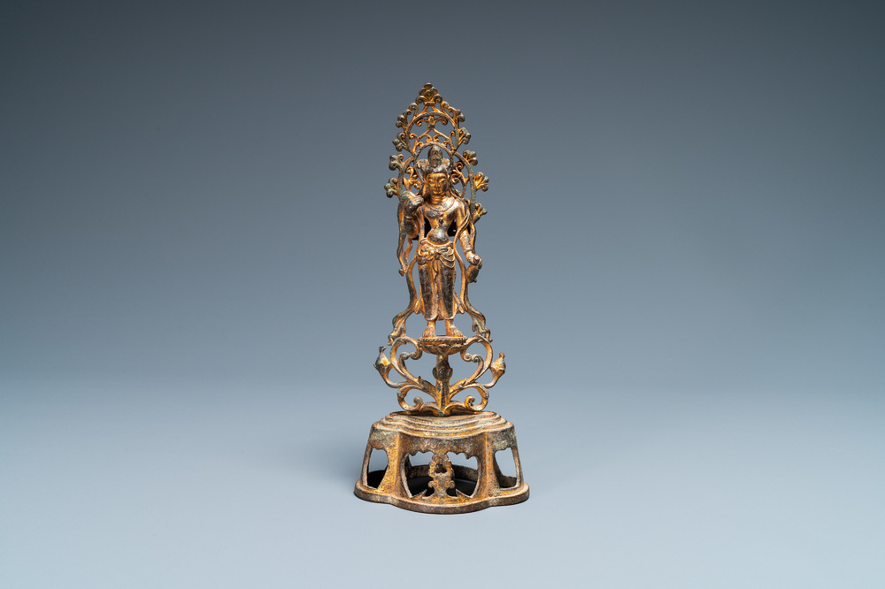 A Chinese gilt bronze figure of Buddha standing, probably Northern Wei dynasty