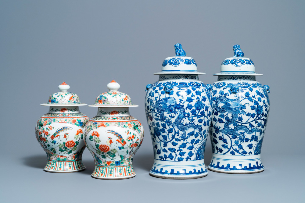 Two pairs of Chinese blue and white and famille verte vases and covers, 19/20th C.