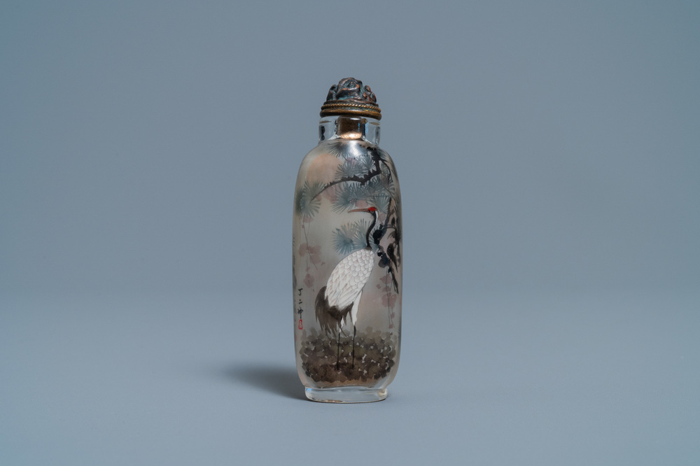 A Chinese inside-painted glass snuff bottle with cranes, signed Ding Erzhong, dated 1895