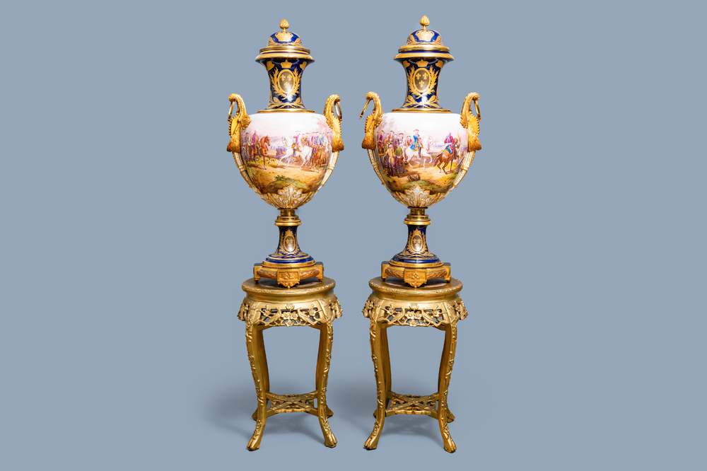 Une paire de tr&egrave;s grands vases en porcelaine dans le style de S&egrave;vres aux montures en bronze dor&eacute;, sign&eacute;s Desprez, France, 19&egrave;me