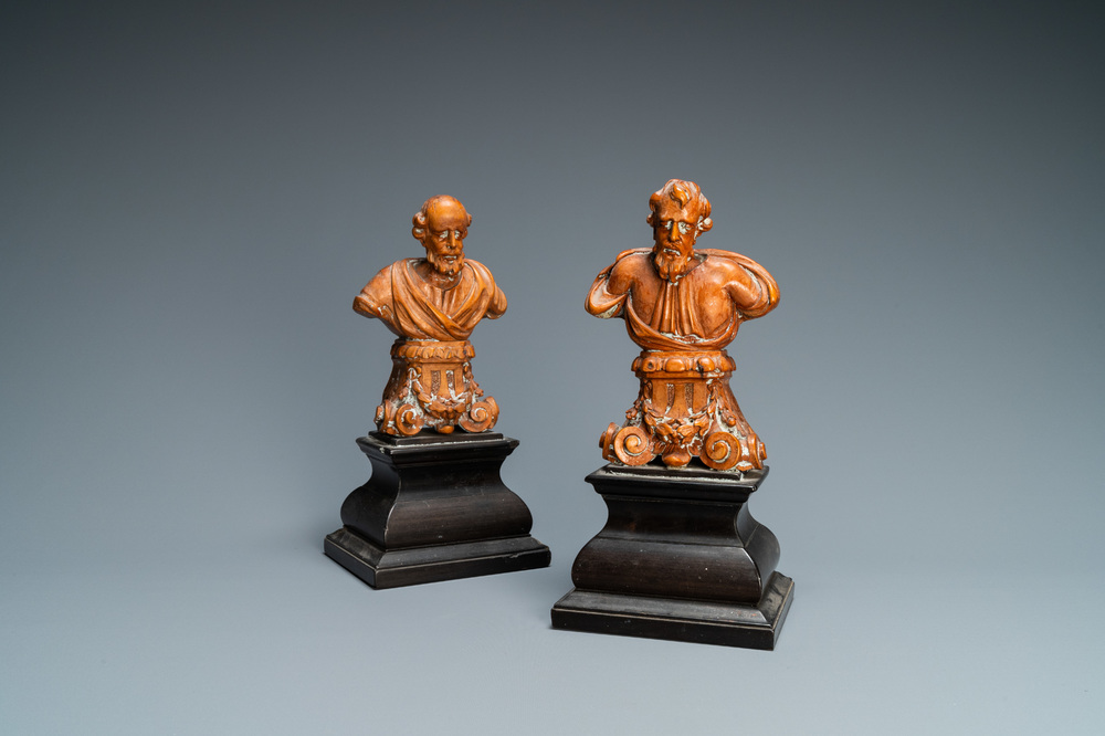 A pair of boxwood busts of a saint on an ebony veneer base, 17th C.