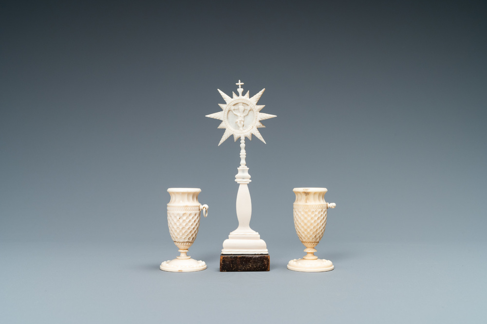 A small ivory crucifix monstrance and a pair of small bone candlesticks, Dieppe, France, 19th C.