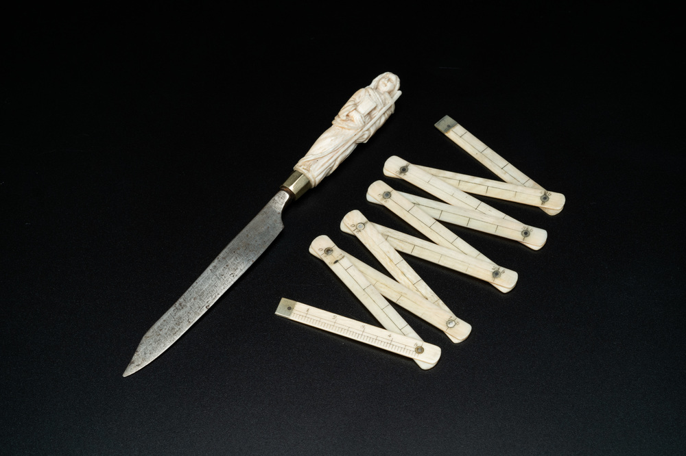 An ivory-handled knife depicting the theological virtue of faith and an ivory folding tailor's ruler, 17/18th and 19th C.