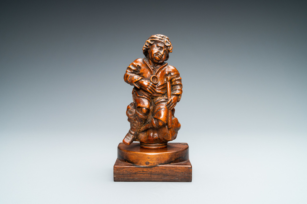 A boxwood figure of a beggar, Flanders, 17/18th C.