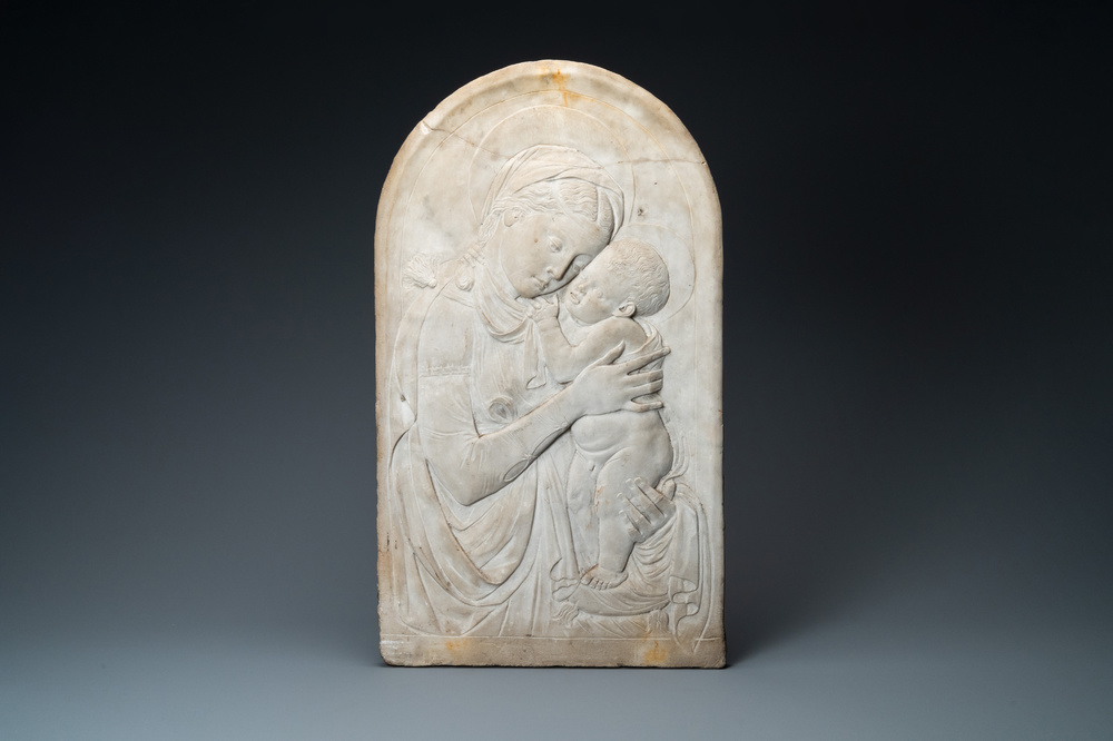 Italian school, 19th C., after Desiderio da Settignano (1430-1464): a marble bas-relief with a Virgin with Child