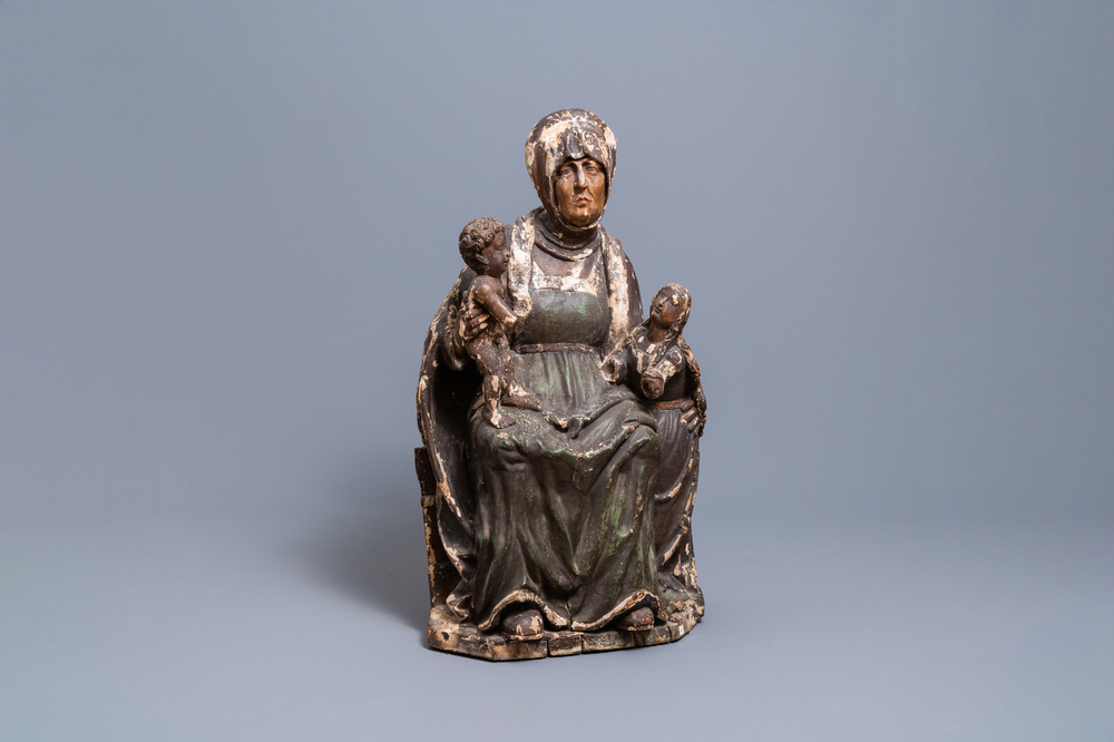 A large polychromed limewood Saint Anne Trinity group, Germany, dated 1519