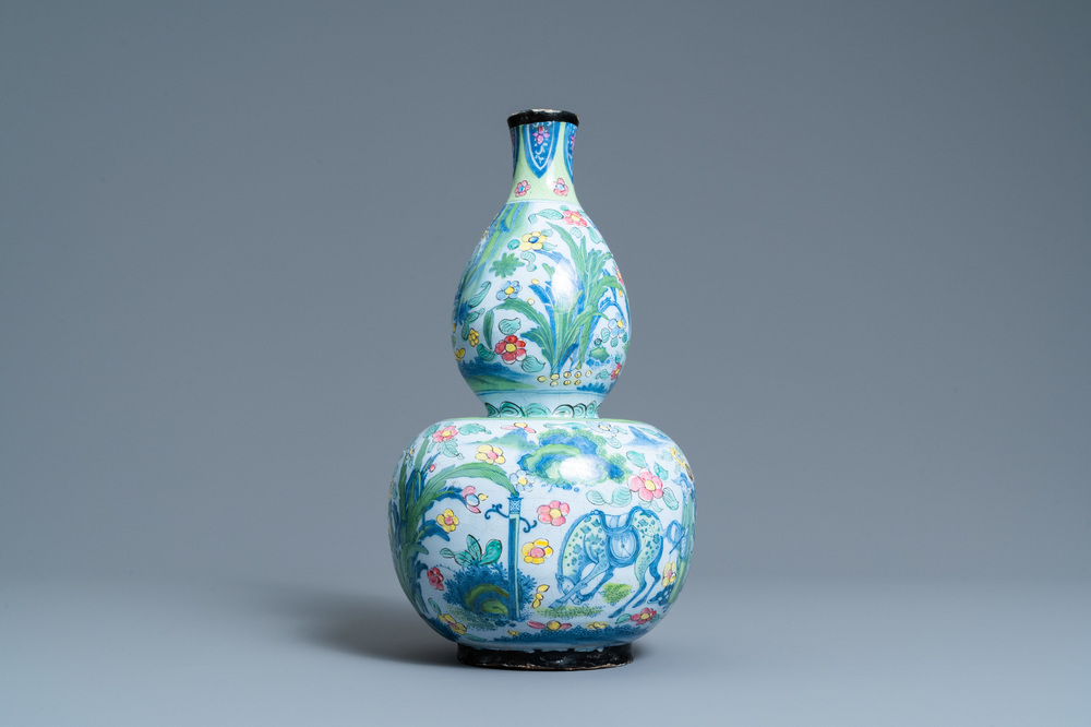 A clobbered Dutch Delft blue and white chinoiserie vase with a pseudo-Chinese mark, ca. 1700
