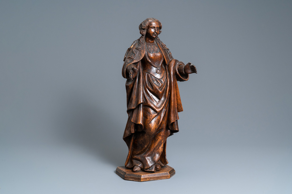 A fruitwood figure of a female saint, Rhine valley, Germany, 2nd half 16th C.