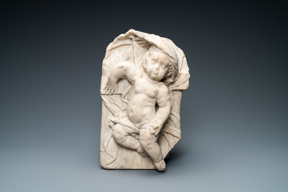A marble figure of the infant Jesus lying on the cross, France or Italy, 17th C.