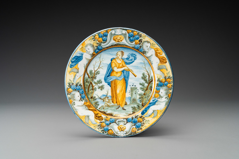 A polychrome plate with a female saint, Grue workshop, Castelli, Italy, 18th C.