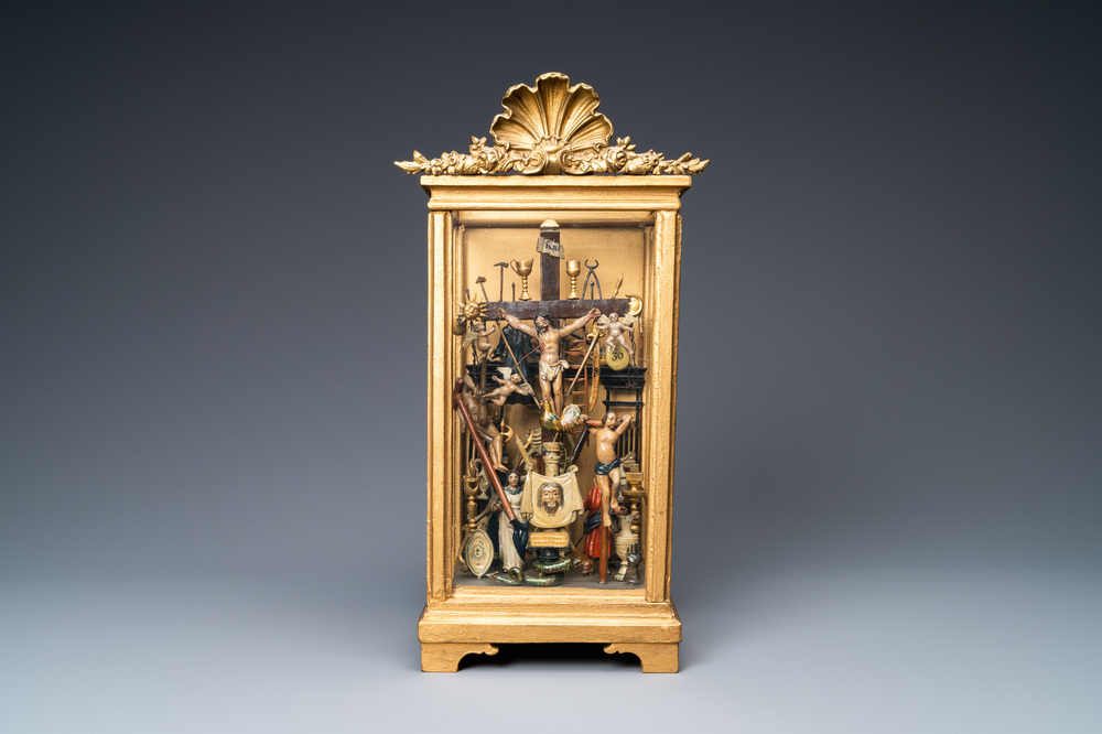A polychromed wooden 'Golgotha' group with all the Instruments of the Passion in glass display, France or Italy, 18th C.