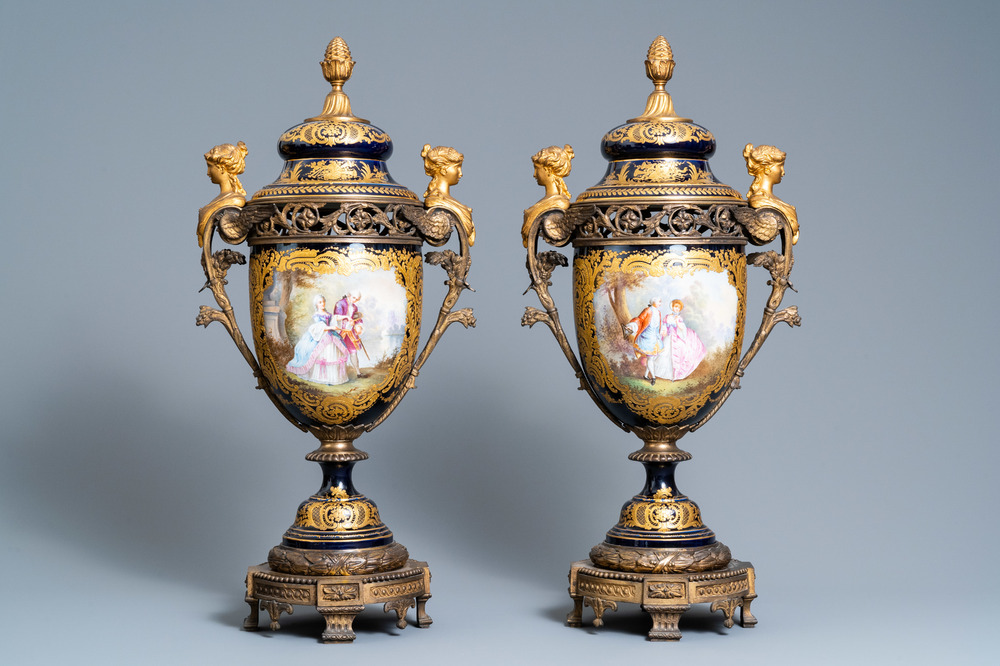 Une paire de grands vases en porcelaine dans le style de S&egrave;vres aux montures en bronze dor&eacute;, sign&eacute;s Le Berre, France, 19&egrave;me