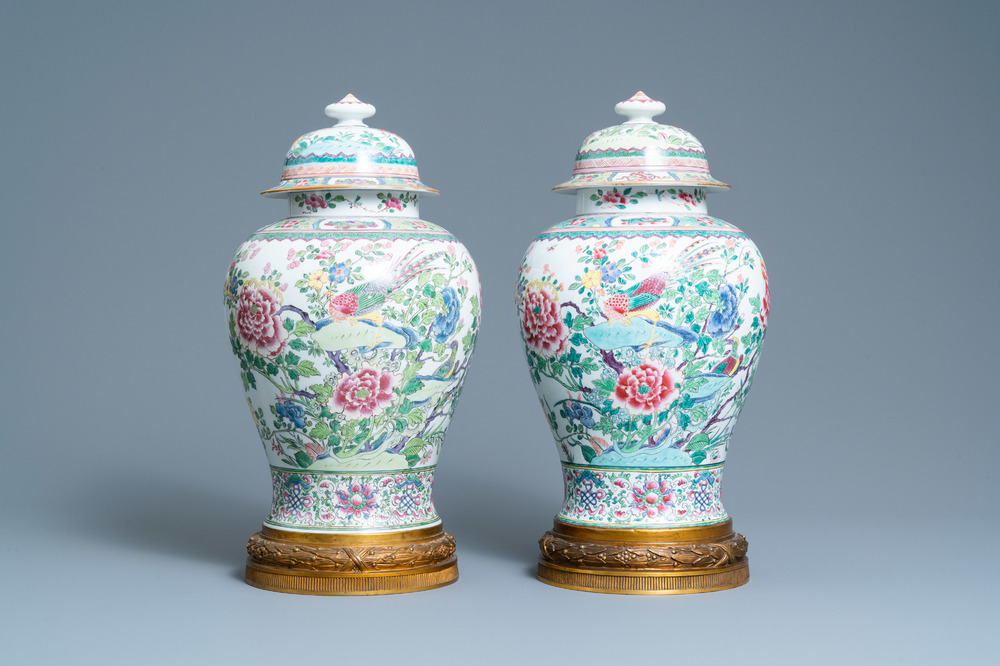 A pair of tall gilt bronze-mounted famille rose-style baluster vases and covers, Samson, Paris, 19th C.