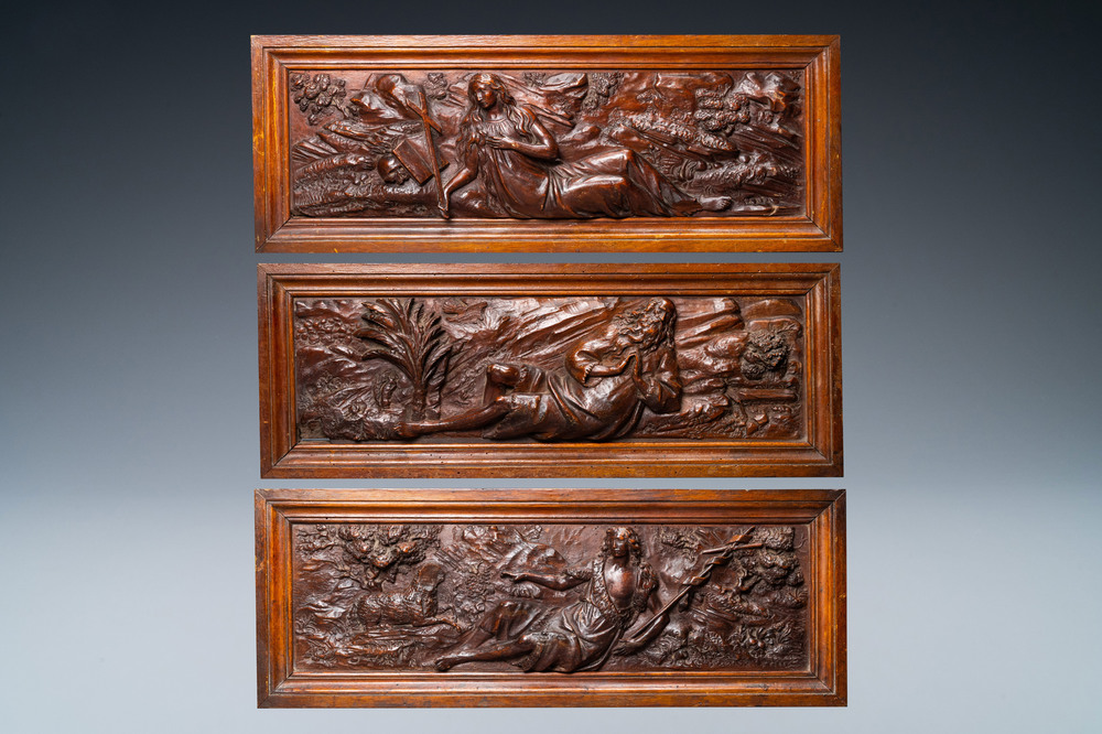 Three walnut deep-relief panels depicting Mary Magdalen, David the shepherd and Elijah in the desert, Italy, 17th C.