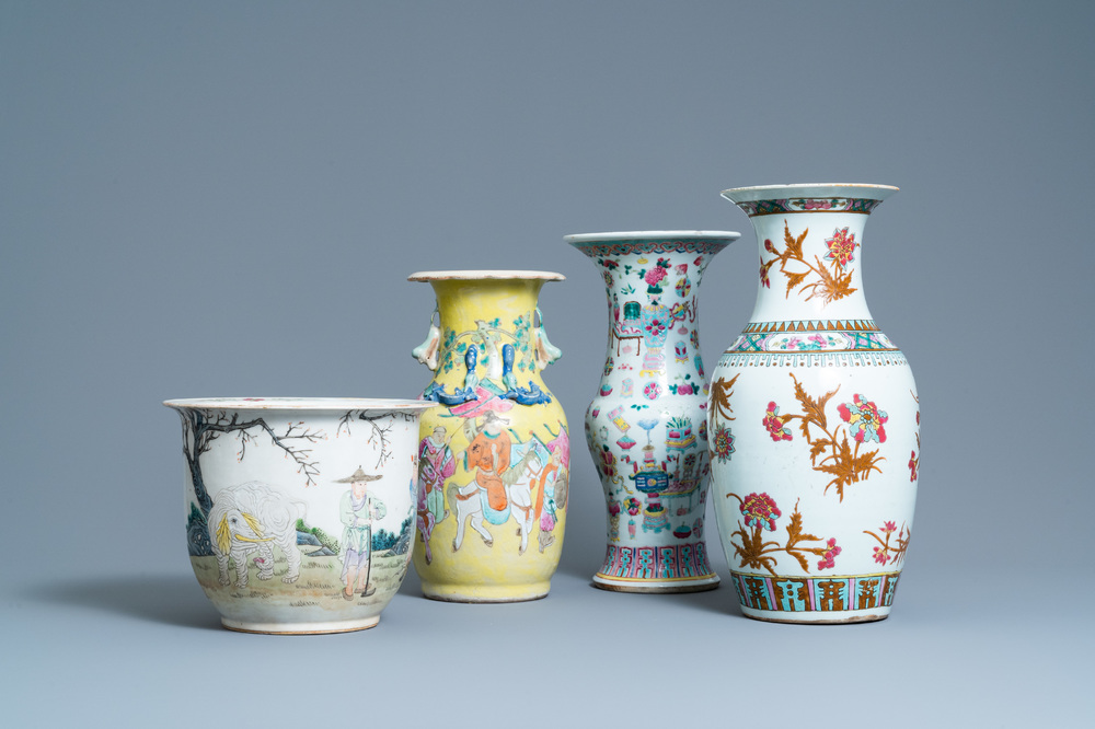 Three Chinese famille rose vases and a jardini&egrave;re, 19th C.