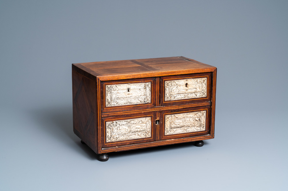 A small mahogany veneer cabinet with engraved bone plaques, Italy, 17th C.